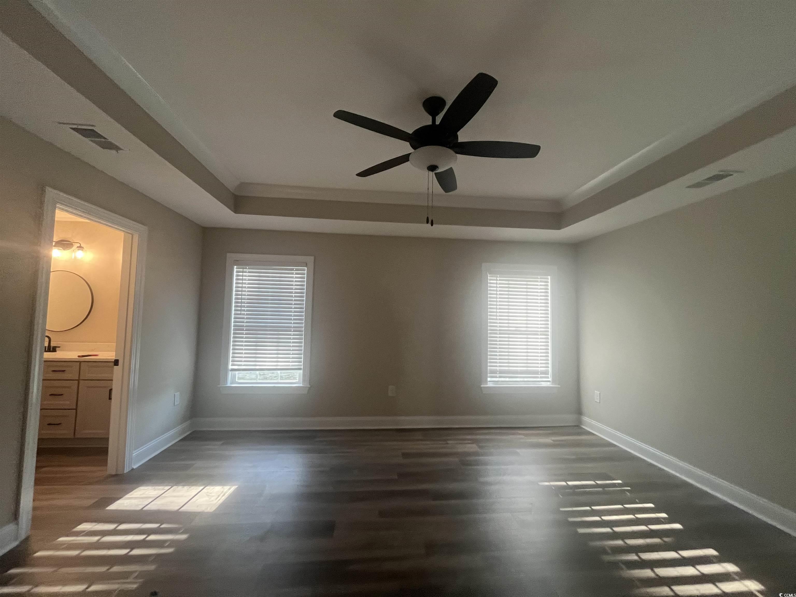 2925 Hughes Gasque Road Aynor, SC 29511 - Photo 6 of 12 Unfurnished bedroom with a raised ceiling, wood fi