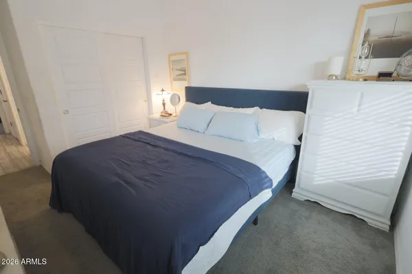 a en suite bathroom with a sink and a mirror