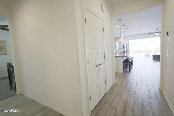 a kitchen with granite countertop white cabinets stainless steel appliances and sink