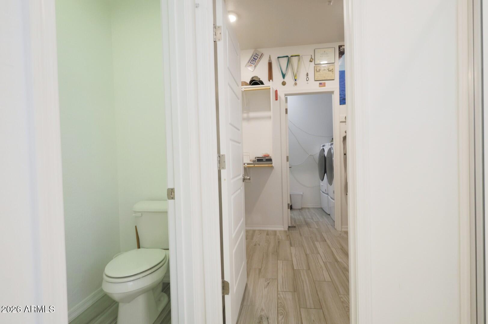 2318 East Harwell Road Phoenix, AZ 85042 - Photo 47 of 89 master bath toilet cabinet