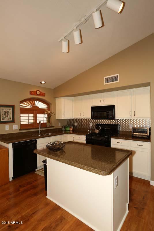 4616 East Jaeger Road Phoenix, AZ 85050 - Photo 12 of 34 jaegerKitchen-Bar