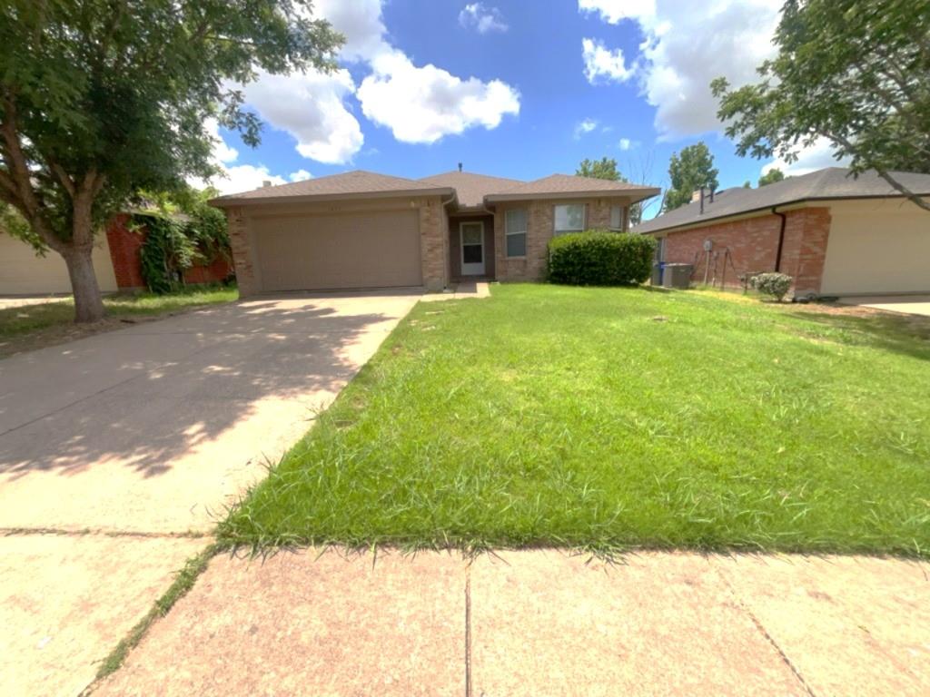 a front view of house with yard