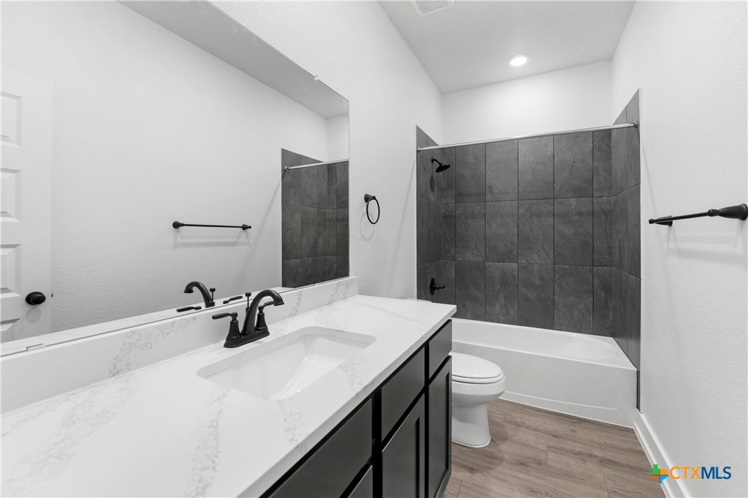 2936 Wolf Rdg Lane Temple, TX 76501 - Photo 11 of 16 Please Note: These interior photos are not of the actual home but are of a completed one with a similar floor plan. Finishes, features, and layouts may vary.*