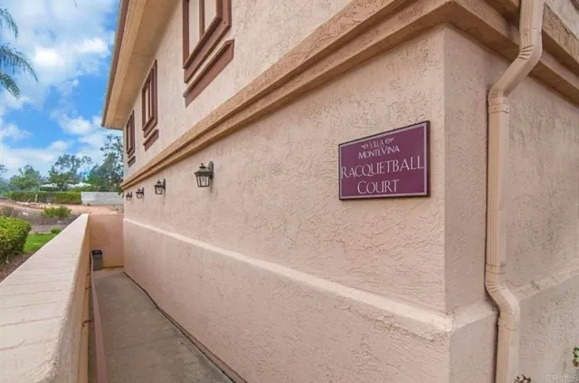 a view of balcony with furniture
