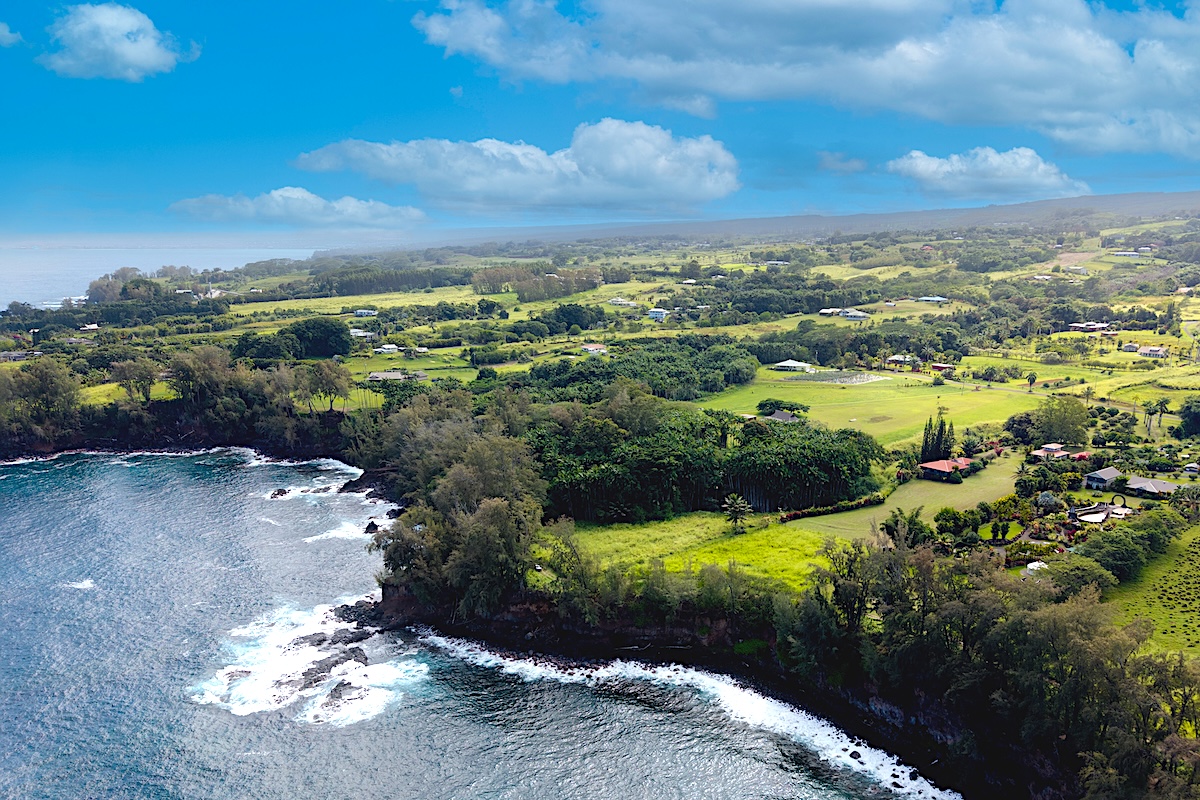 28-3188 Beach Road Pepeekeo, HI 96783 - Photo 6 of 19 a view of a lake with green space