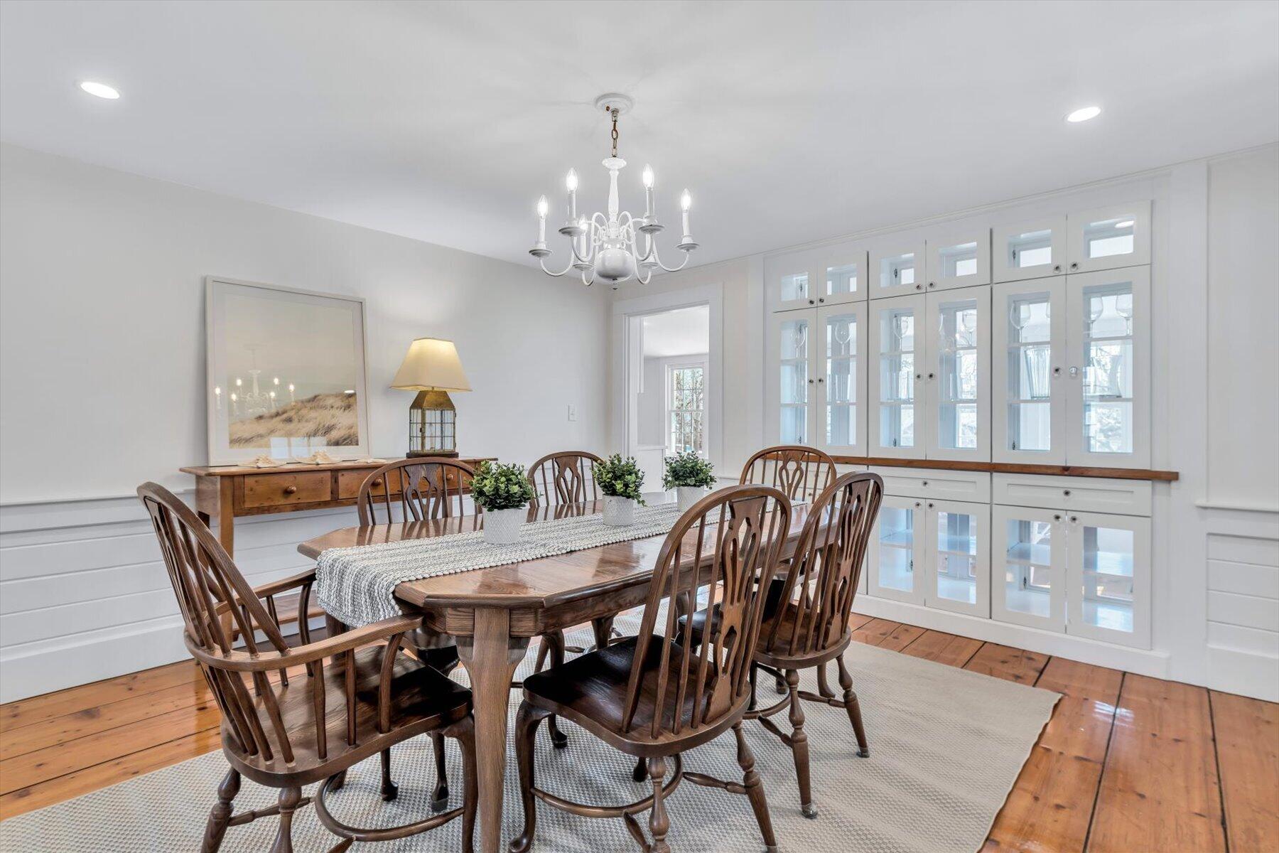 25 Riverside Drive West Harwich, MA 02671 - Photo 11 of 41 a view of a dining room with furniture window and wooden floor