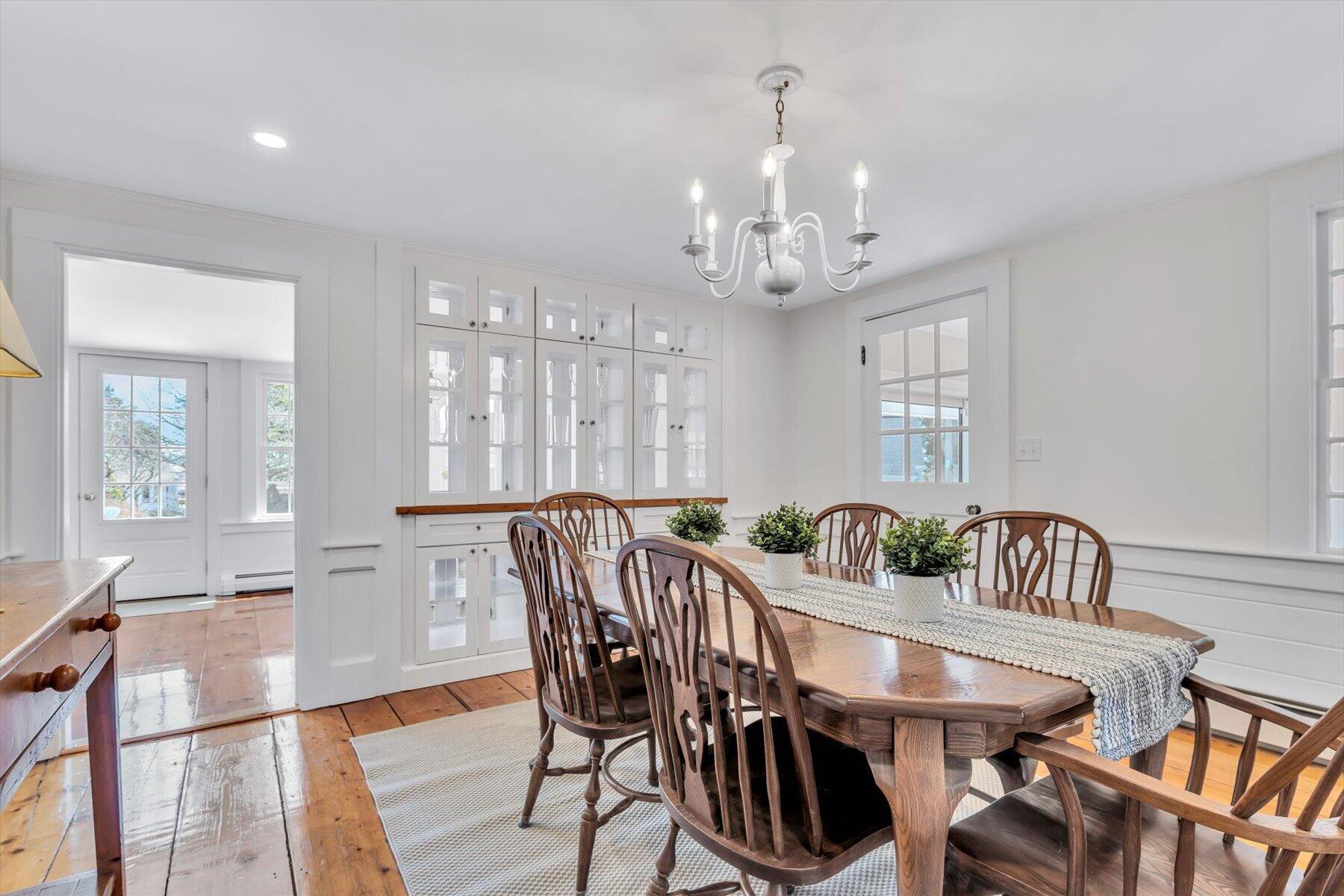 25 Riverside Drive West Harwich, MA 02671 - Photo 12 of 41 a view of a a dining room with furniture window and wooden floor