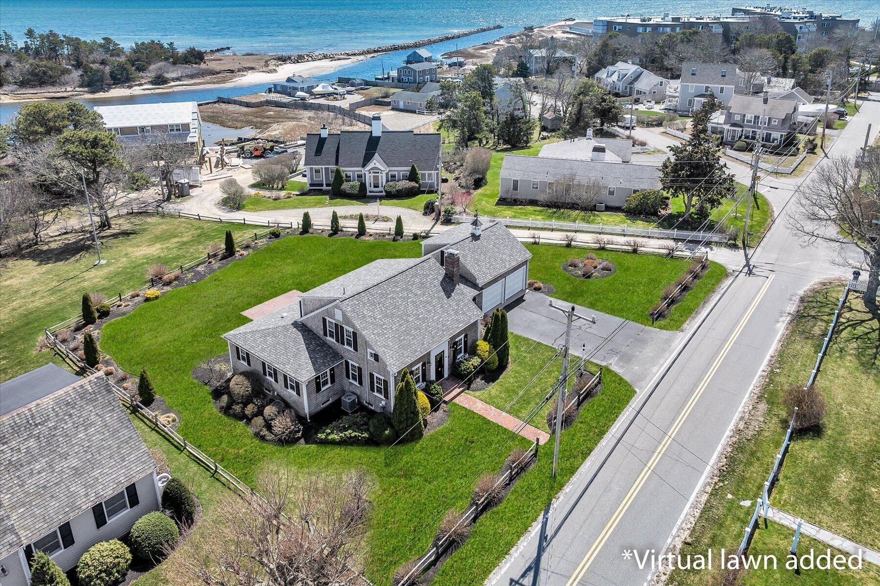 25 Riverside Drive West Harwich, MA 02671 - Photo 2 of 41 an aerial view of a house with garden