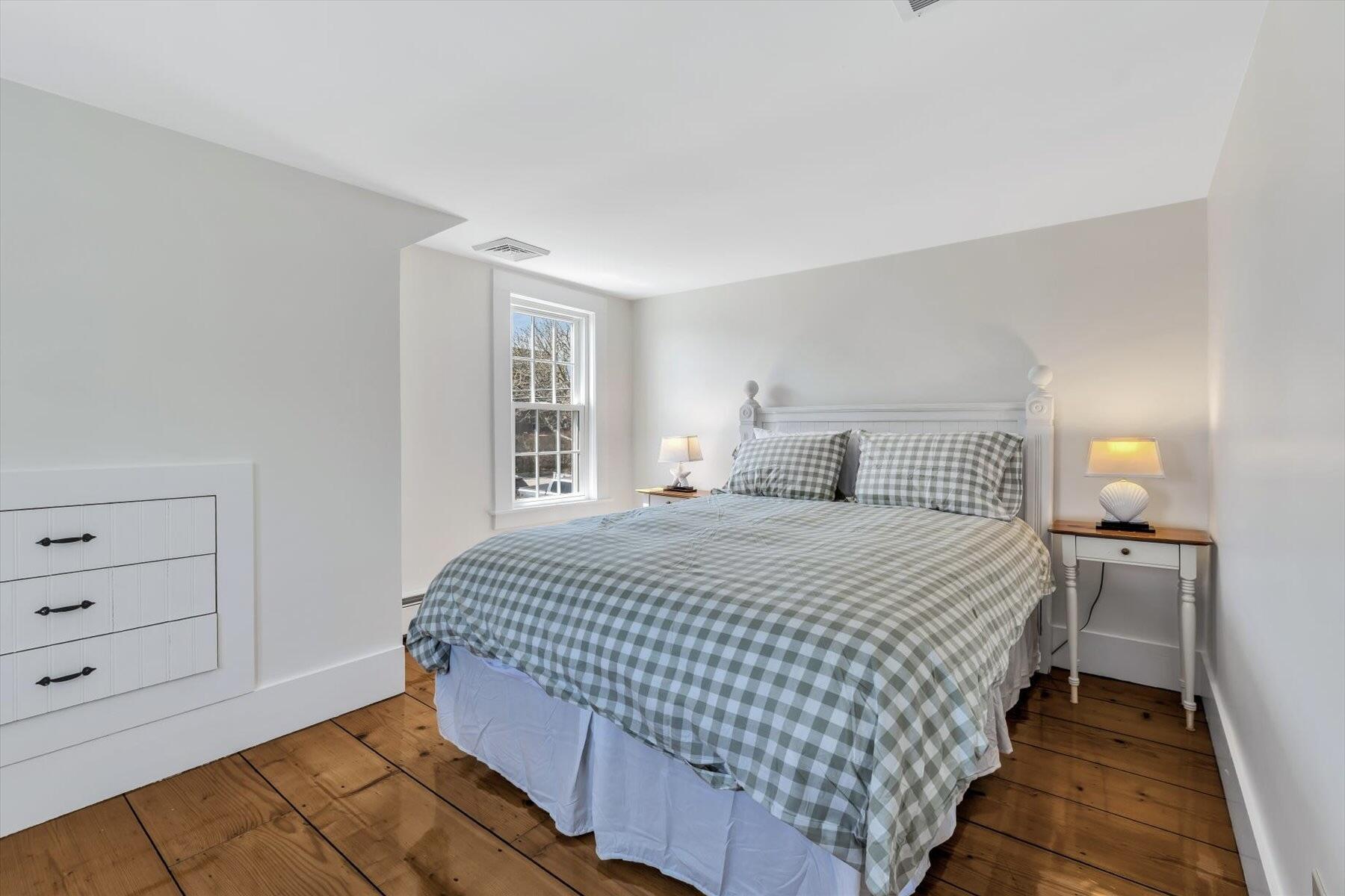 25 Riverside Drive West Harwich, MA 02671 - Photo 29 of 41 a bedroom with a bed and window