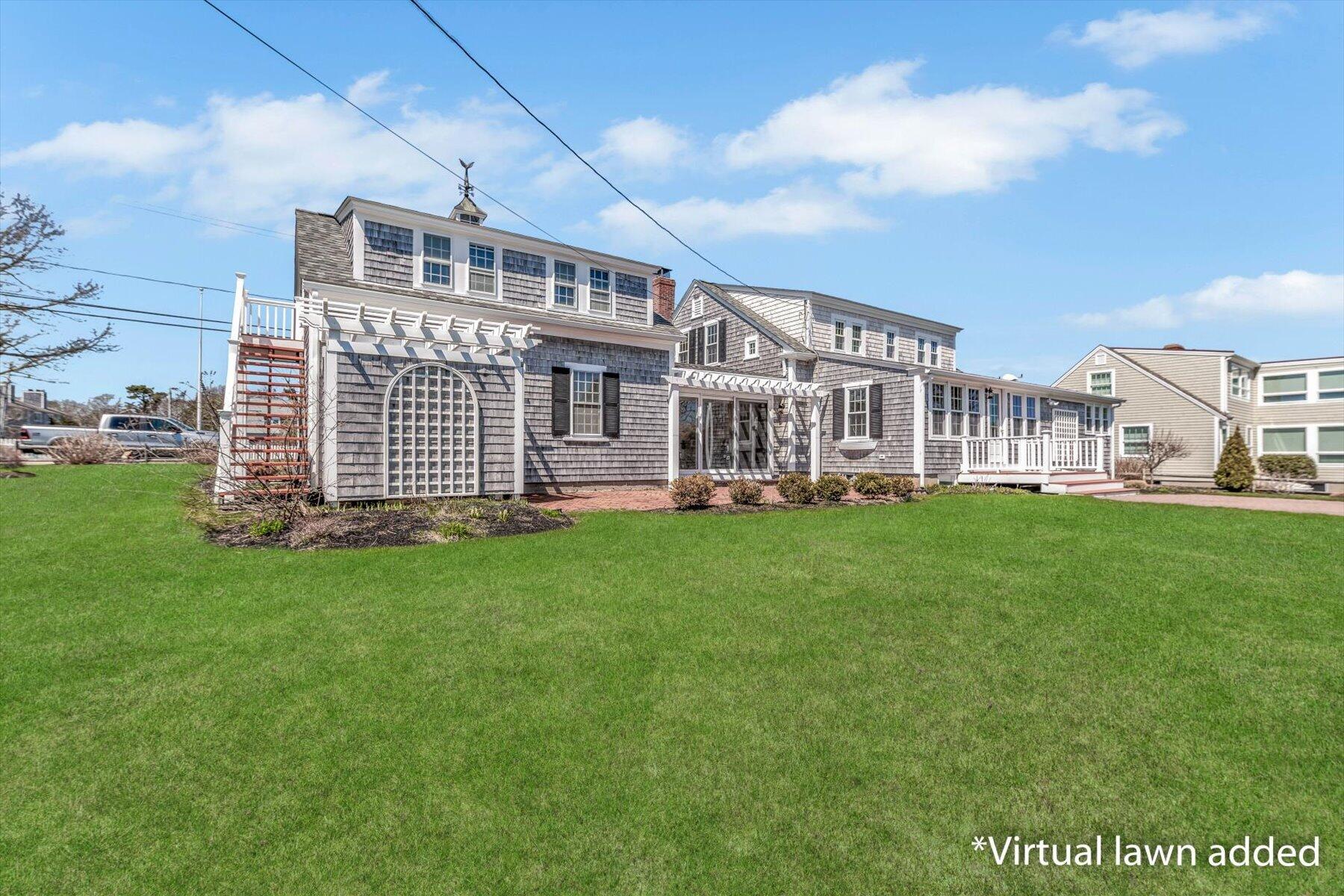 25 Riverside Drive West Harwich, MA 02671 - Photo 33 of 41 a view of a house with a yard