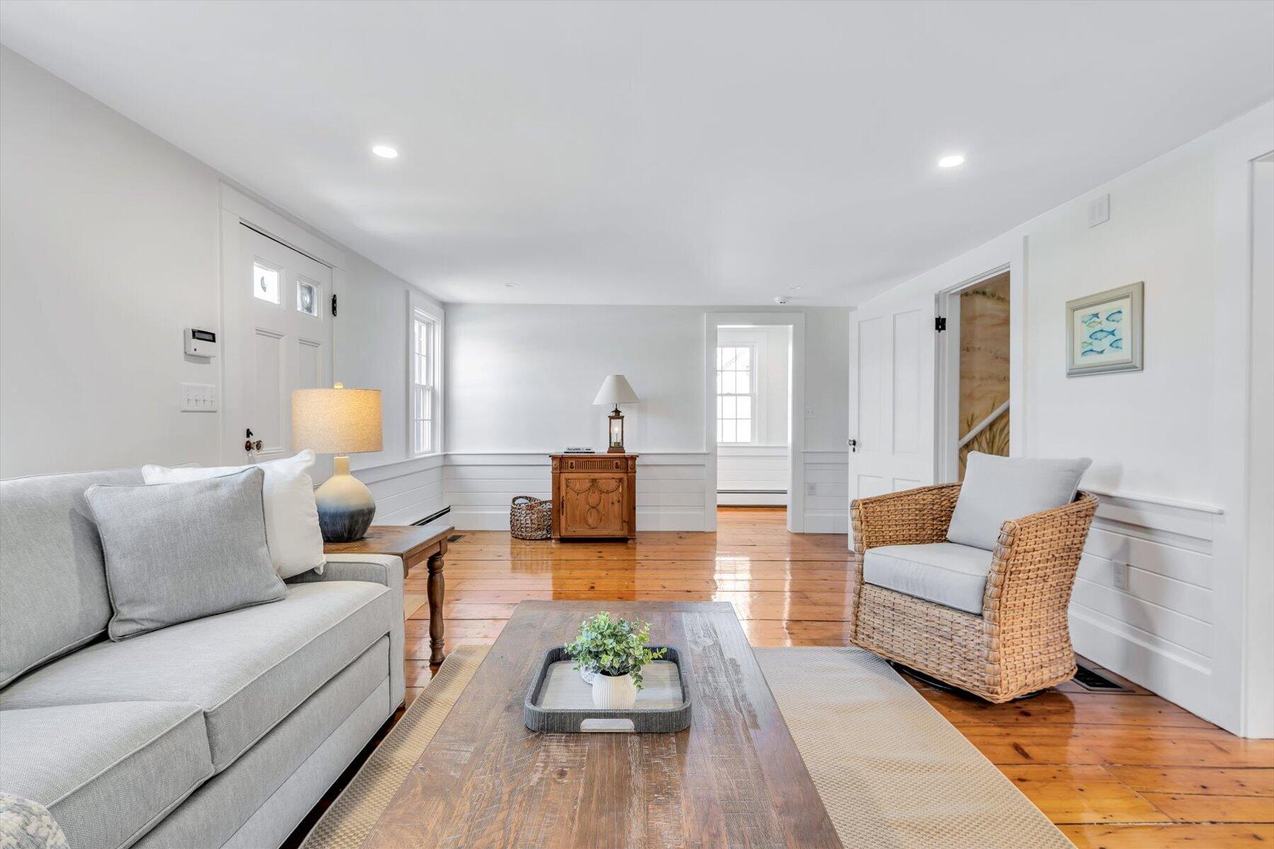 25 Riverside Drive West Harwich, MA 02671 - Photo 9 of 41 a living room with furniture and wooden floor