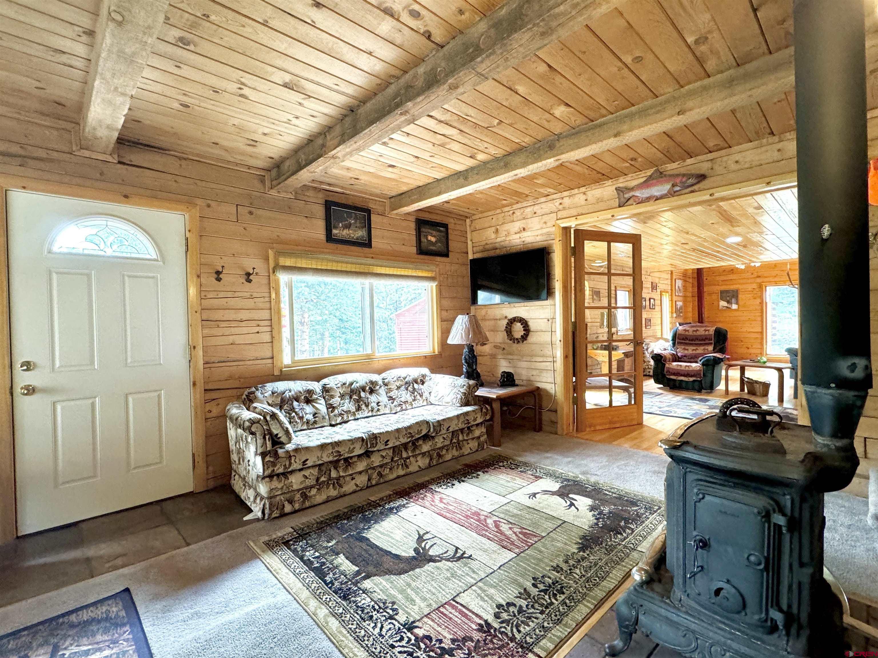 0 Forest Road Del Norte, CO 81132 - Photo 11 of 40 a living room with furniture and a rug