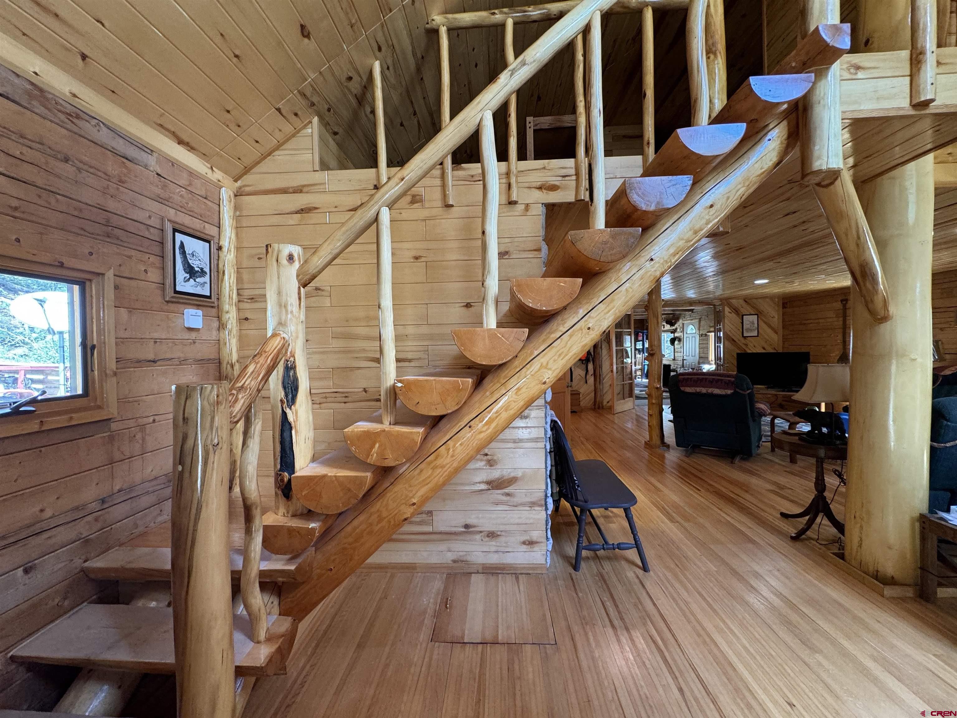 0 Forest Road Del Norte, CO 81132 - Photo 30 of 40 a view of entryway with wooden floor and stairs