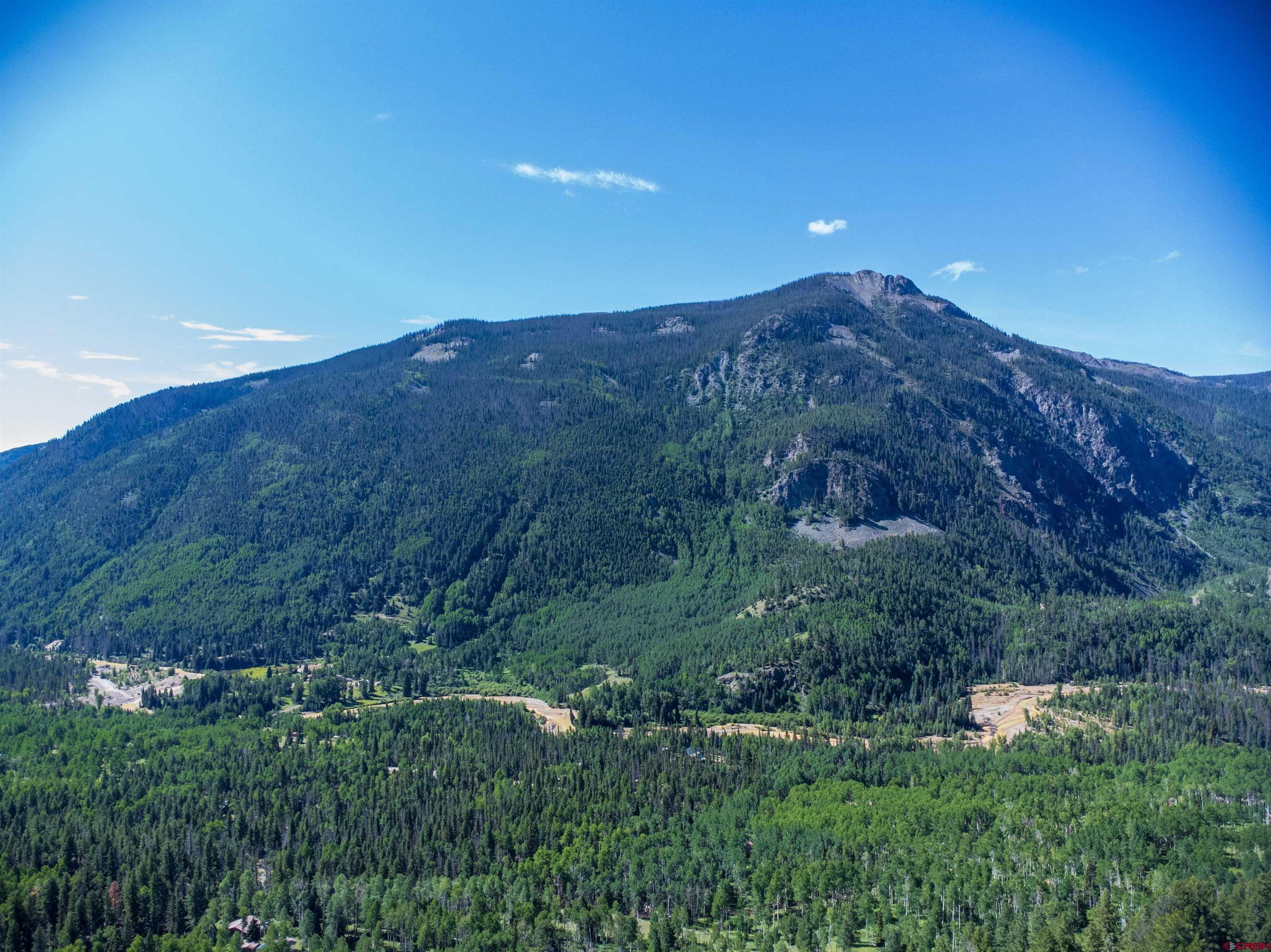 0 Forest Road Del Norte, CO 81132 - Photo 37 of 40 a view of a lush green mountain and a mountain view