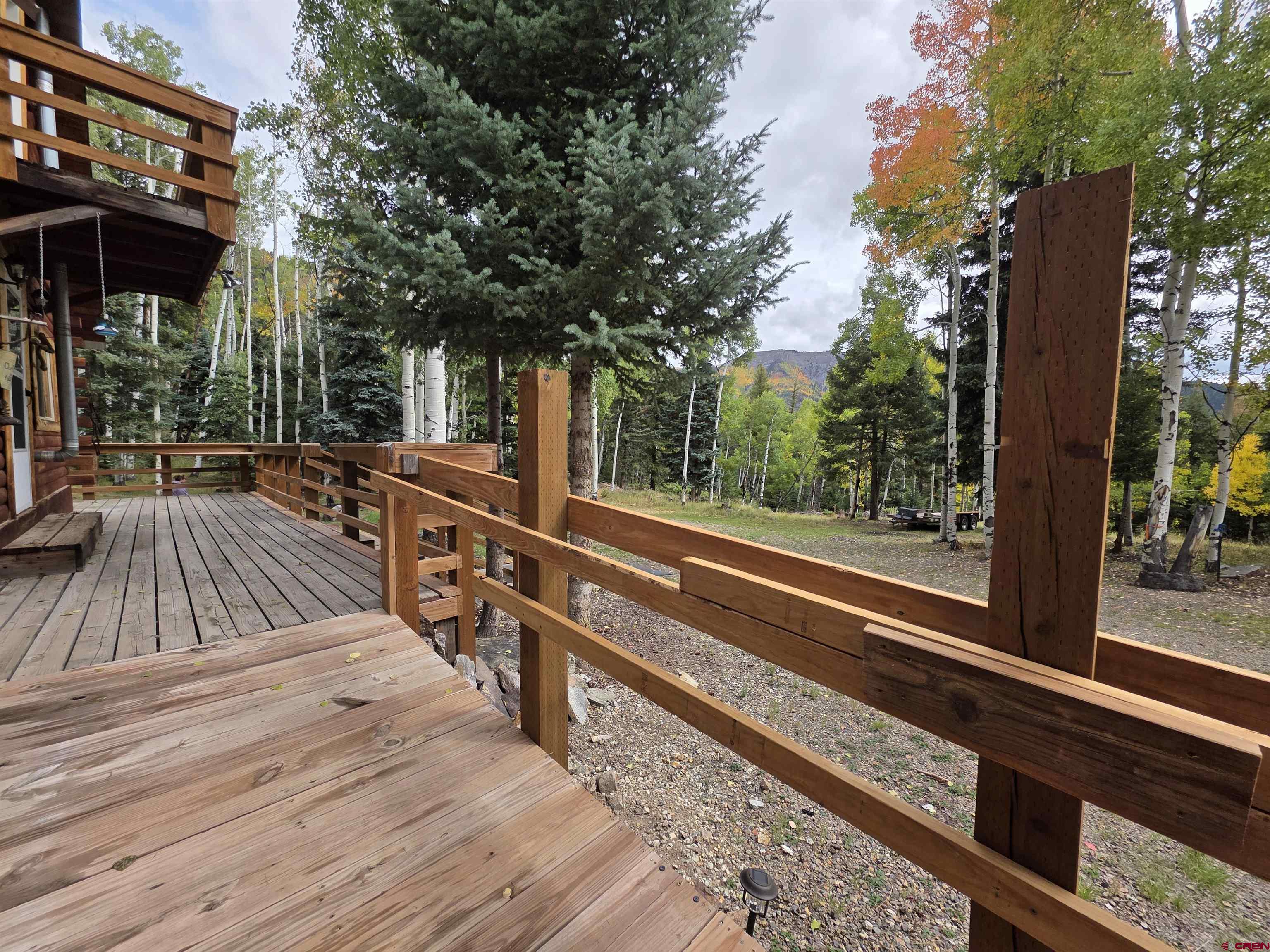 0 Forest Road Del Norte, CO 81132 - Photo 4 of 40 a view of balcony with wooden floor and fence