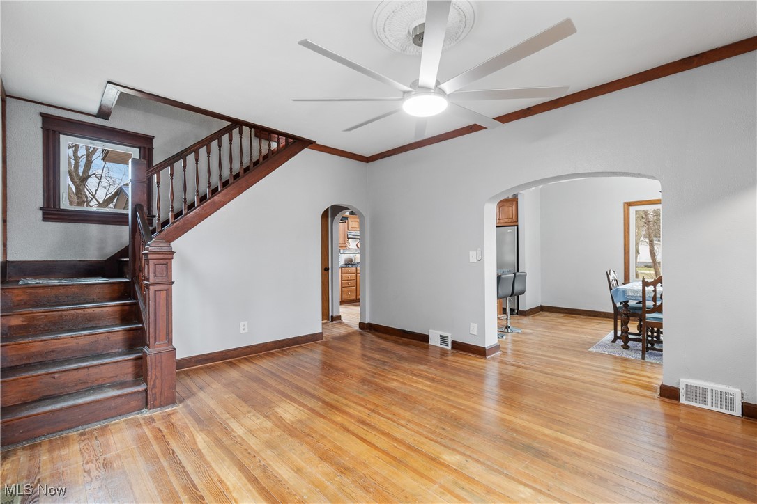 6349 Manchester Road Clinton, OH 44216 - Photo 11 of 23 Living room with ceiling fan and light hardwood / wood-style floors