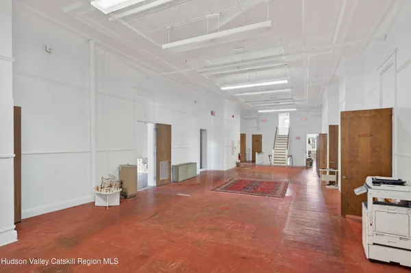 a view of a livingroom with a staircase