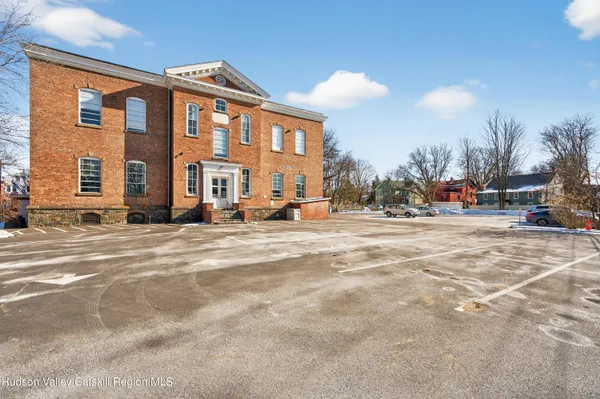 a view of a street with houses