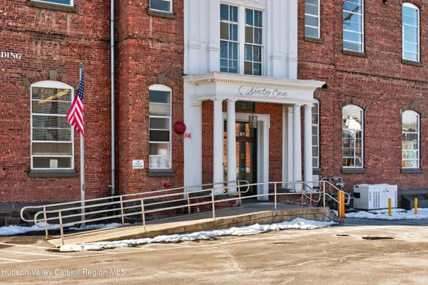 a front view of a building with a outdoor space