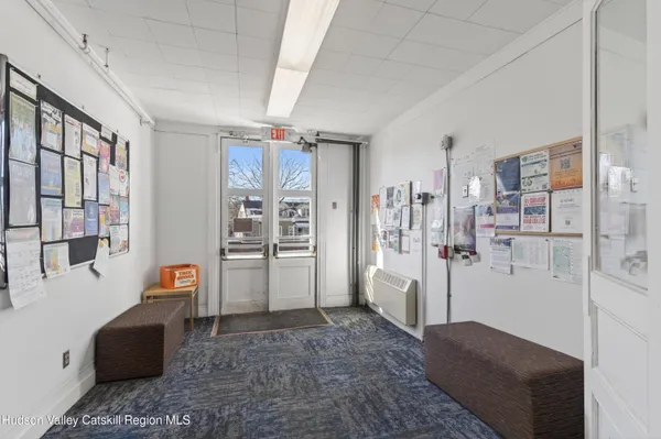 a view of livingroom with furniture and windows