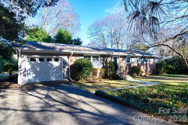 a view of swimming pool with a patio