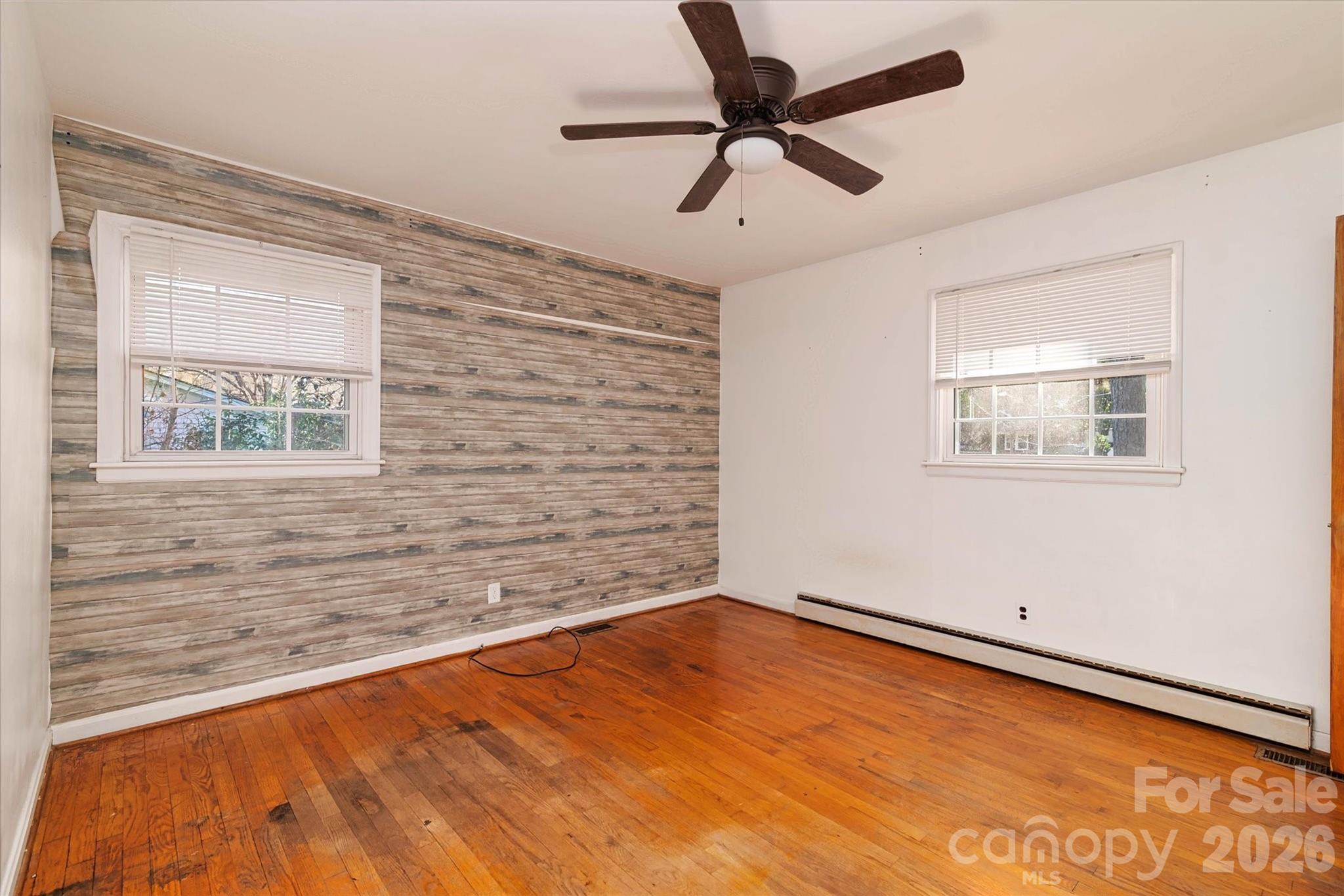 1736 Ebinport Road Rock Hill, SC 29732 - Photo 17 of 34 a view of a big room with wooden floor and windows