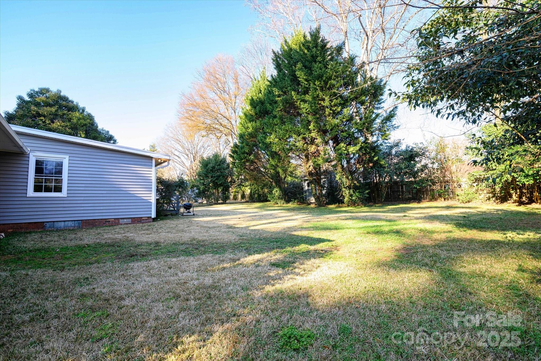 1736 Ebinport Road Rock Hill, SC 29732 - Photo 27 of 35 a view of backyard of house with trees