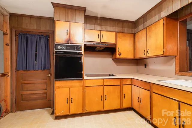 a view of gallery with wooden floor