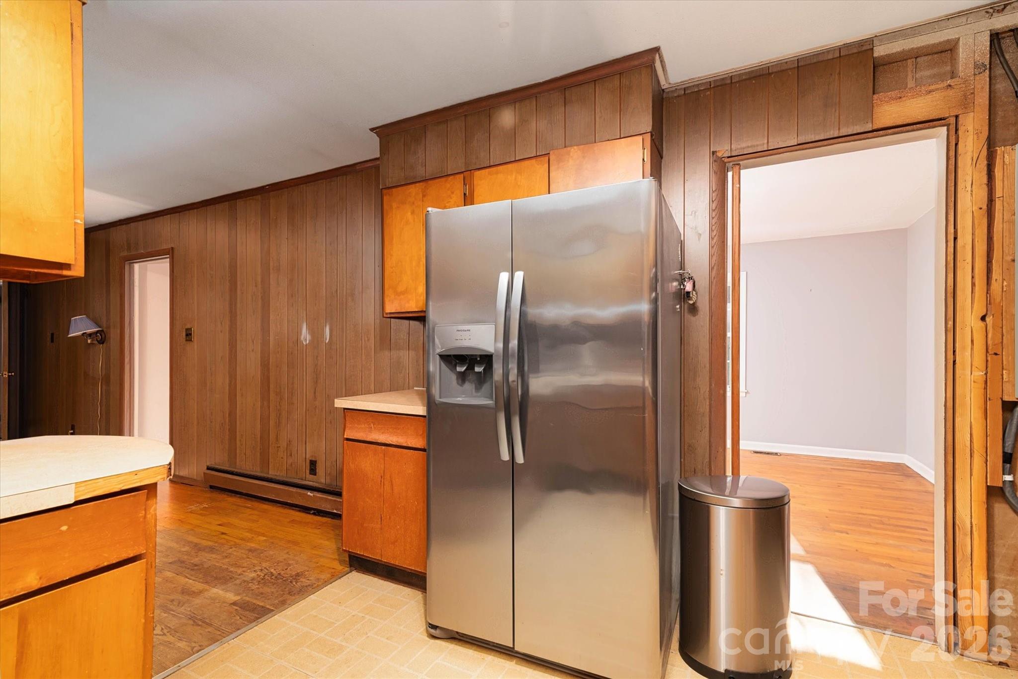 1736 Ebinport Road Rock Hill, SC 29732 - Photo 8 of 34 a kitchen with a refrigerator and a more cabinets