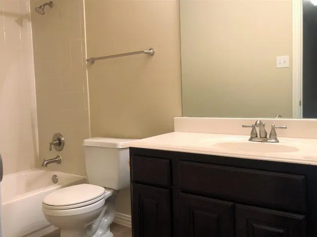 a bathroom with a sink and a toilet