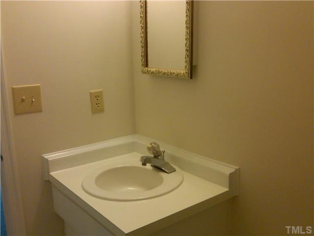 3140 Morningside Drive Raleigh, NC 27607 - Photo 20 of 25 Each bathroom includes a medicine cabinet.