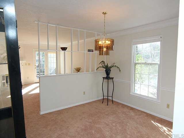 3140 Morningside Drive Raleigh, NC 27607 - Photo 3 of 25 View the garden outdoors and or fireplace from dining room.