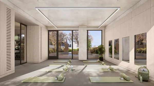 a living room with furniture and large windows