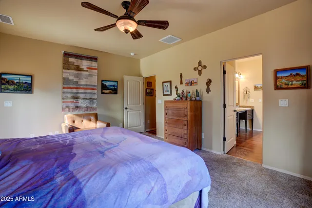 a bedroom with a bed and a walk in closet