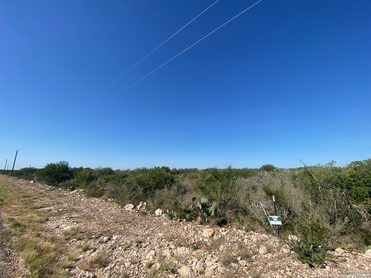583 Legend Hills Uvalde, TX 78801 - Photo 2 of 6 a view of a mountain range with a forest