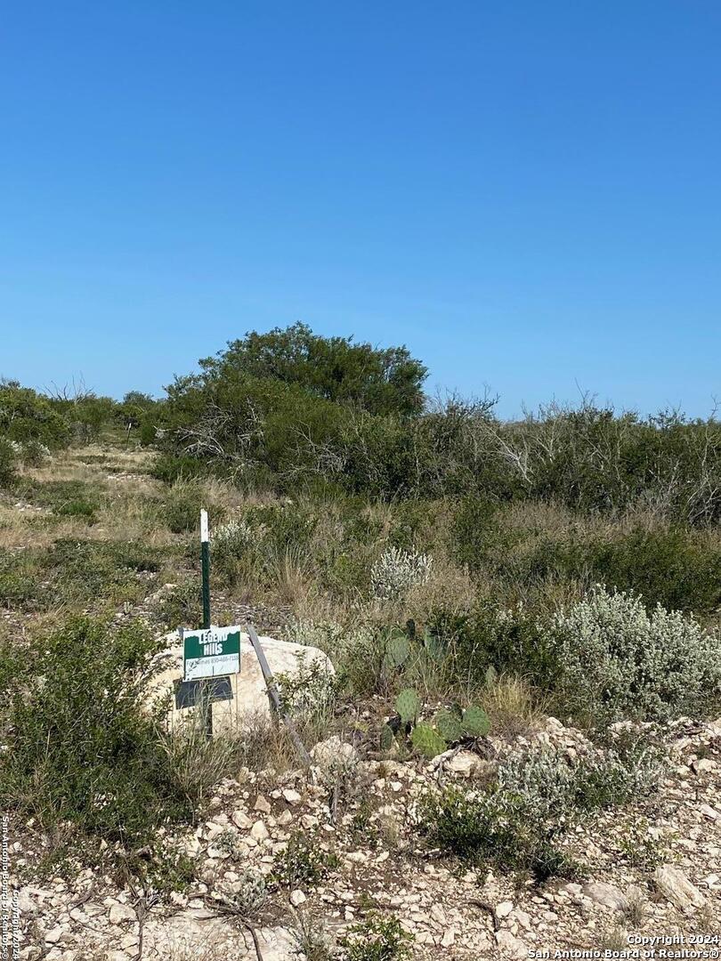 583 Legend Hills Uvalde, TX 78801 - Photo 4 of 6 a view of a town with mountains in the background