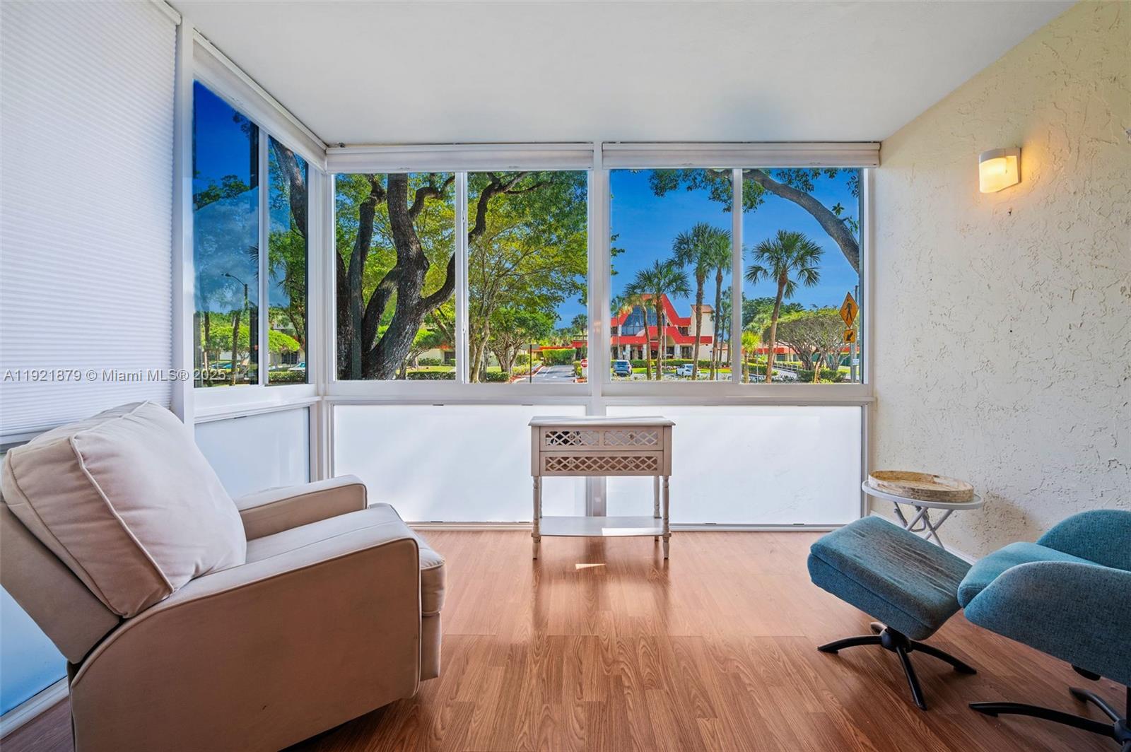 3140 Holiday Springs Boulevard, Unit 9102 Margate, FL 33063 - Photo 2 of 35 a living room with furniture and a large window