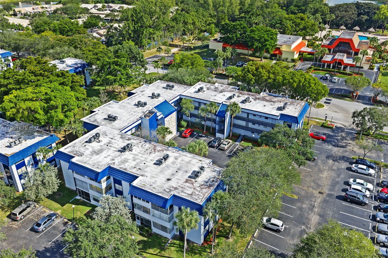 3140 Holiday Springs Boulevard, Unit 9102 Margate, FL 33063 - Photo 31 of 35 an aerial view of a houses with yard