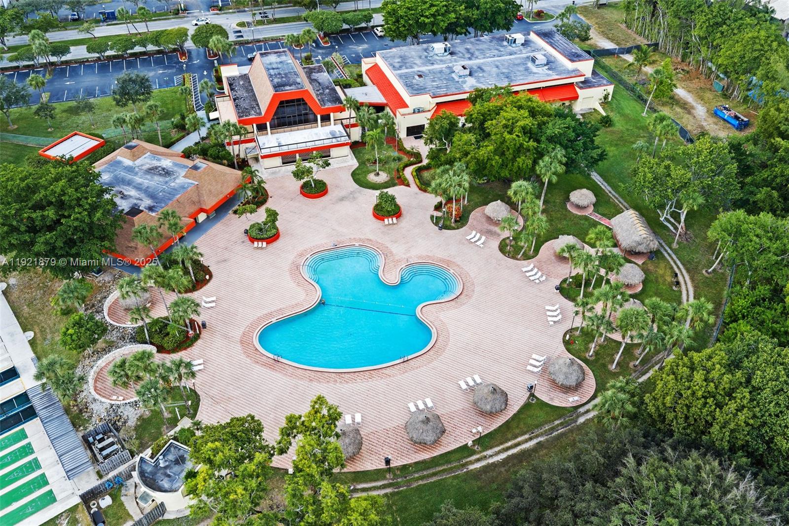 3140 Holiday Springs Boulevard, Unit 9102 Margate, FL 33063 - Photo 32 of 35 aerial view of a house with yard swimming pool and outdoor seating