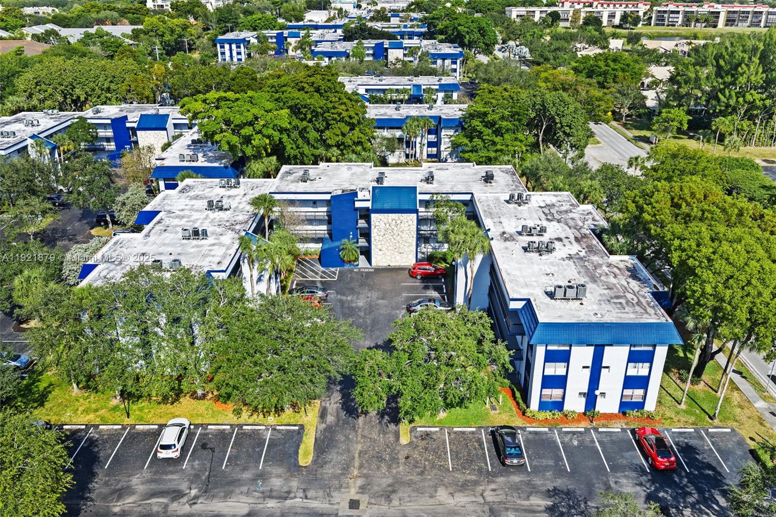3140 Holiday Springs Boulevard, Unit 9102 Margate, FL 33063 - Photo 5 of 35 an aerial view of a house with a garden