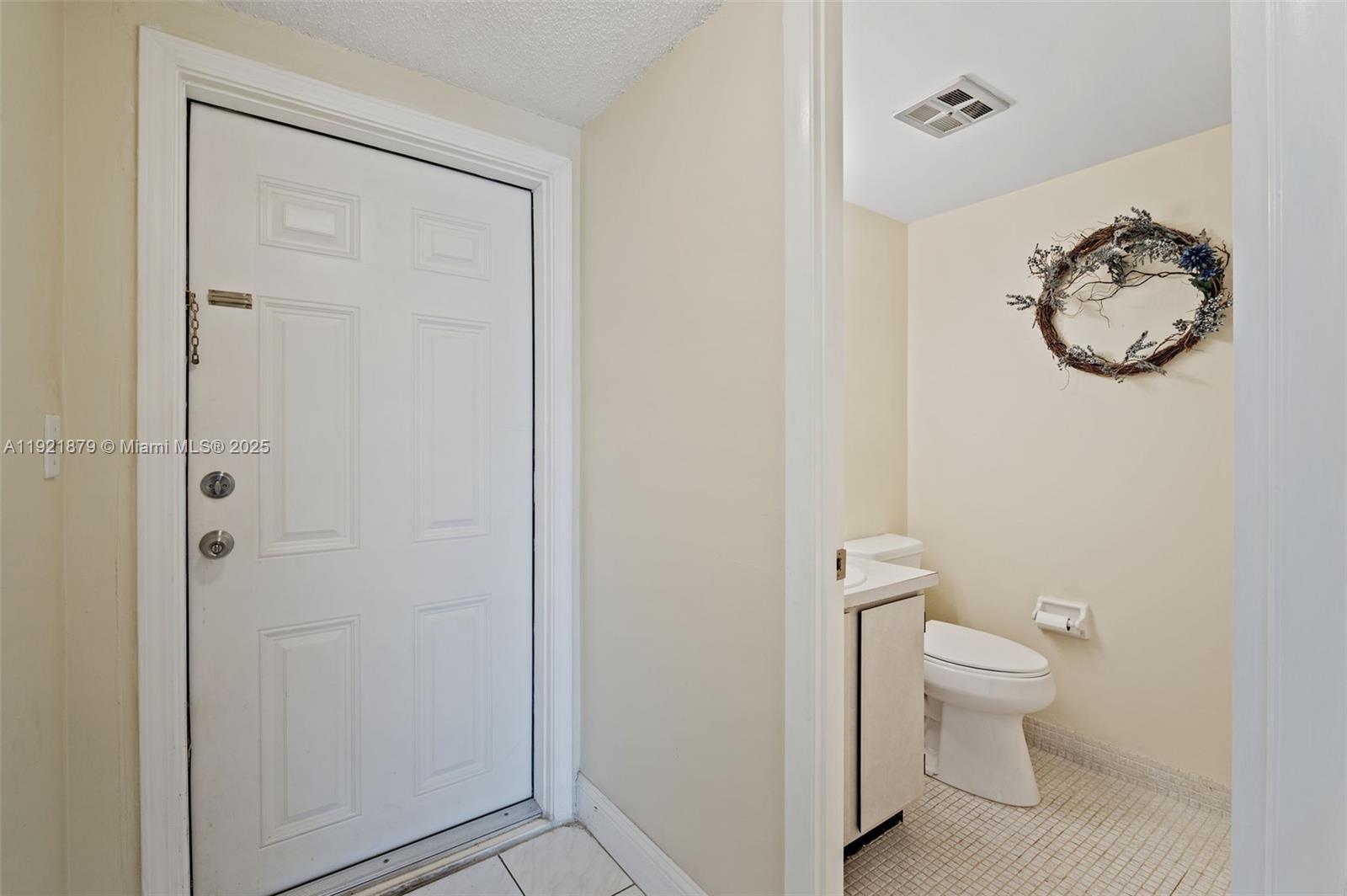 3140 Holiday Springs Boulevard, Unit 9102 Margate, FL 33063 - Photo 10 of 35 a bathroom with a toilet and a shower
