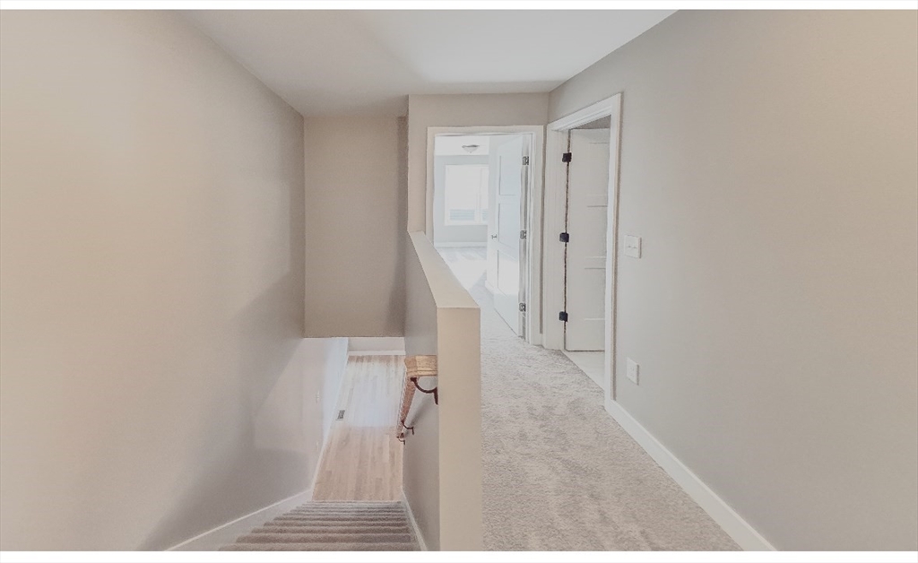 54 Richards Street Worcester, MA 01603 - Photo 21 of 23 a view of wooden floor in a room