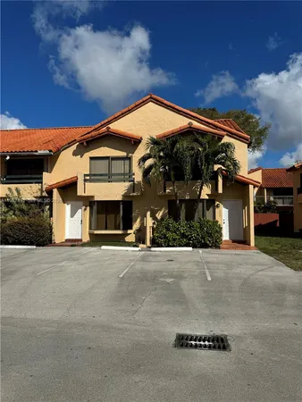 a front view of house with yard