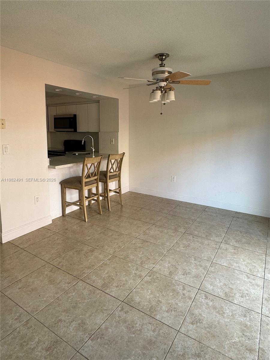 10220 Southwest 77th Court Miami, FL 33156 - Photo 4 of 12 a view of a livingroom with furniture