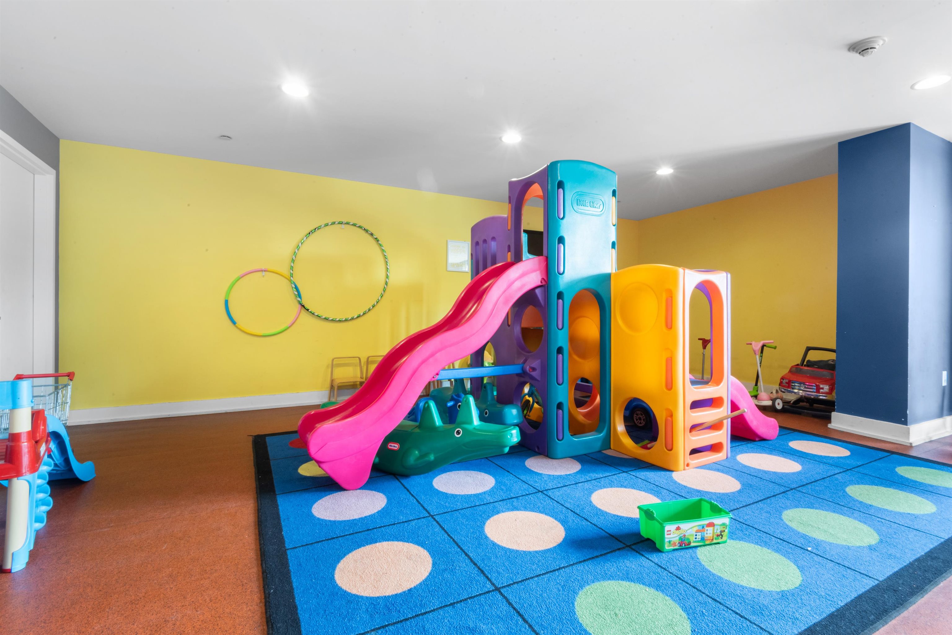 3312 Hudson Avenue, Unit 12F Union City, NJ 07087 - Photo 29 of 32 a view of play room with furniture and wooden floor