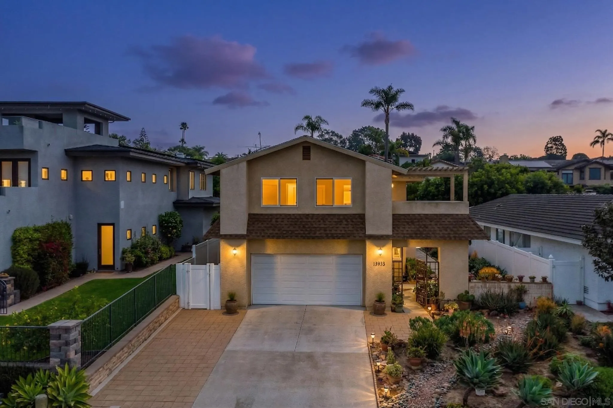 13933 Recuerdo Drive Del Mar, CA 92014 - Photo 1 of 44 a front view of a house with a yard