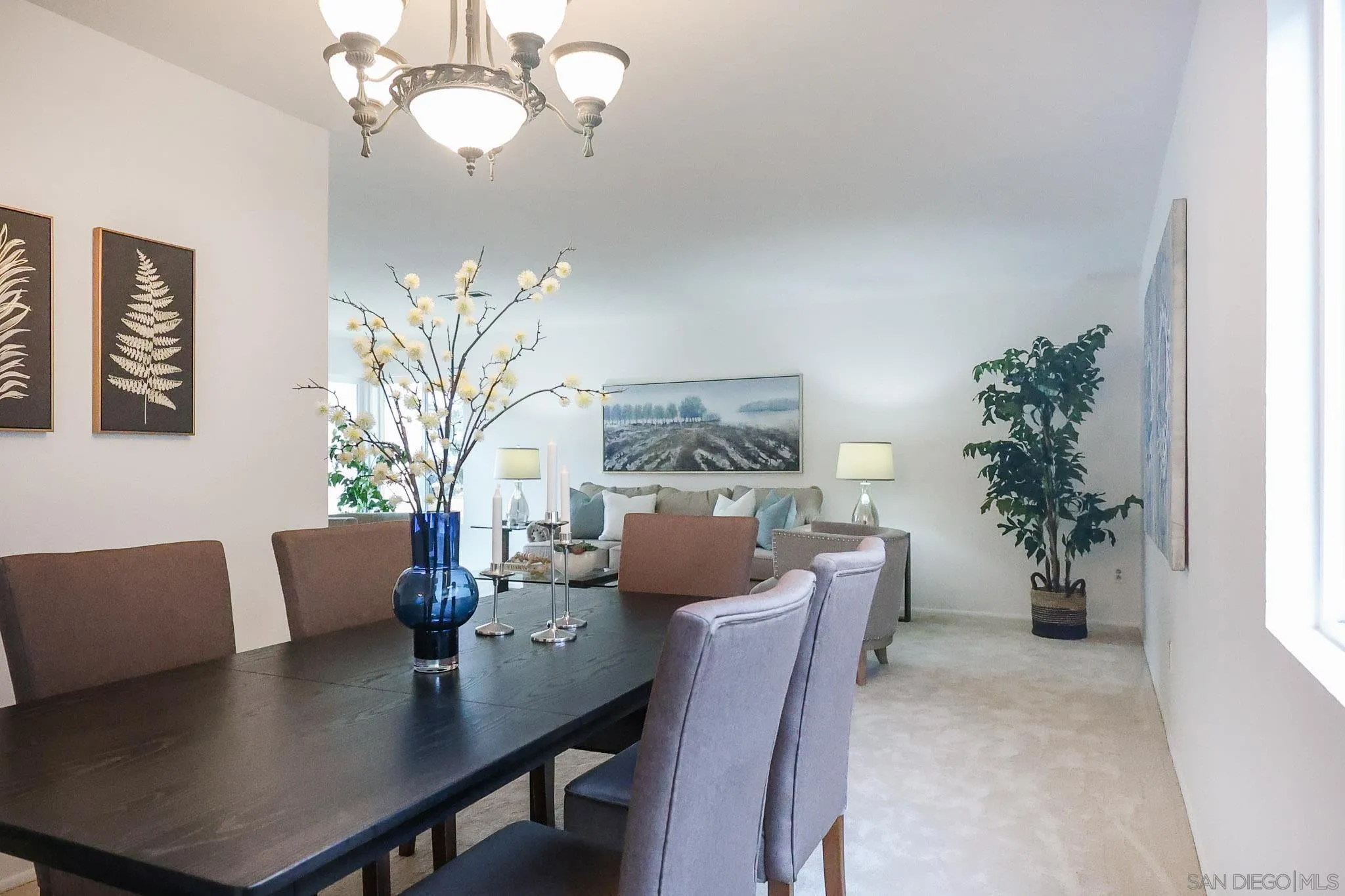 13933 Recuerdo Drive Del Mar, CA 92014 - Photo 11 of 44 a view of a dining room with furniture and chandelier