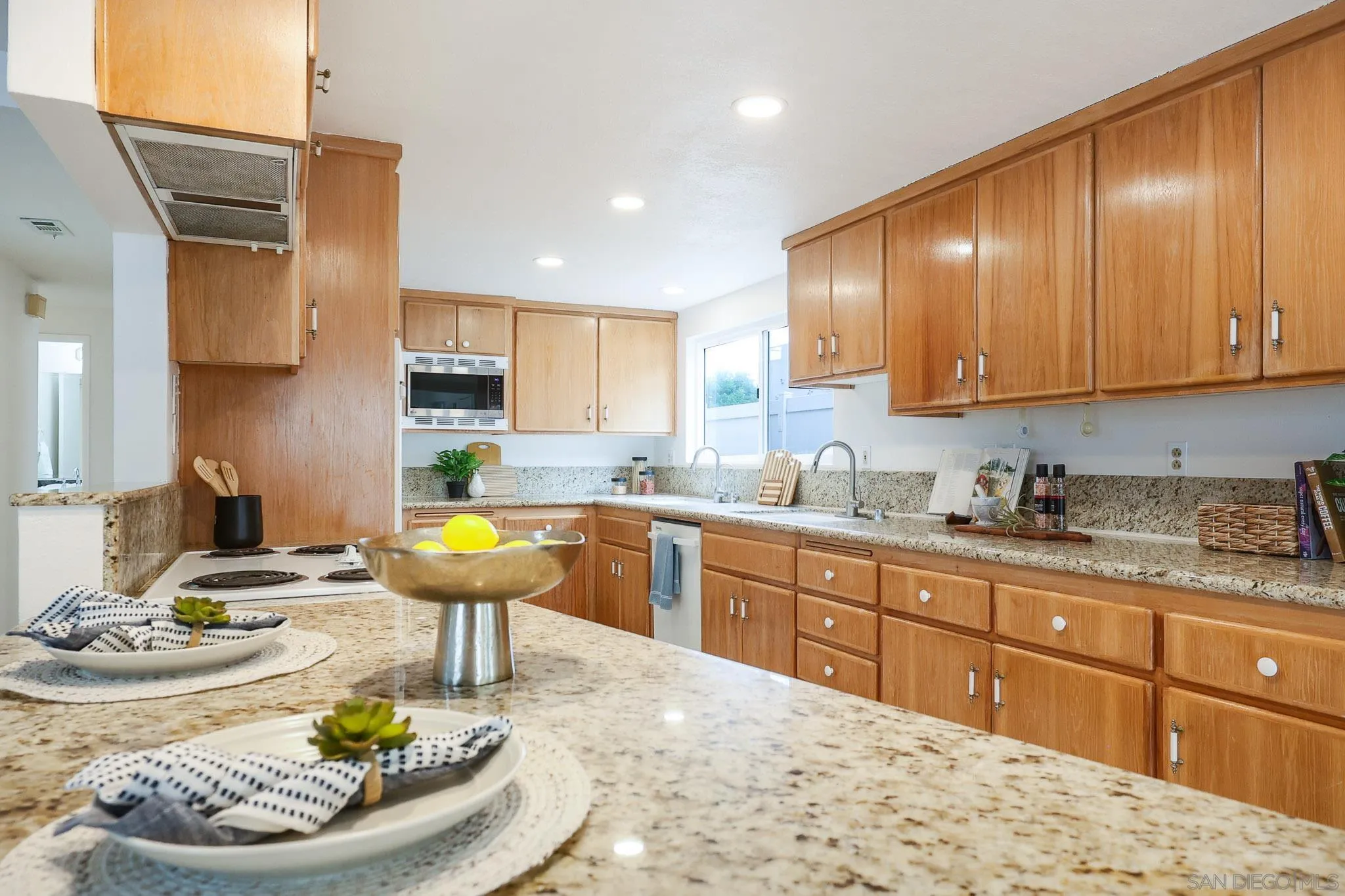 13933 Recuerdo Drive Del Mar, CA 92014 - Photo 14 of 44 a kitchen with a cabinets and appliances