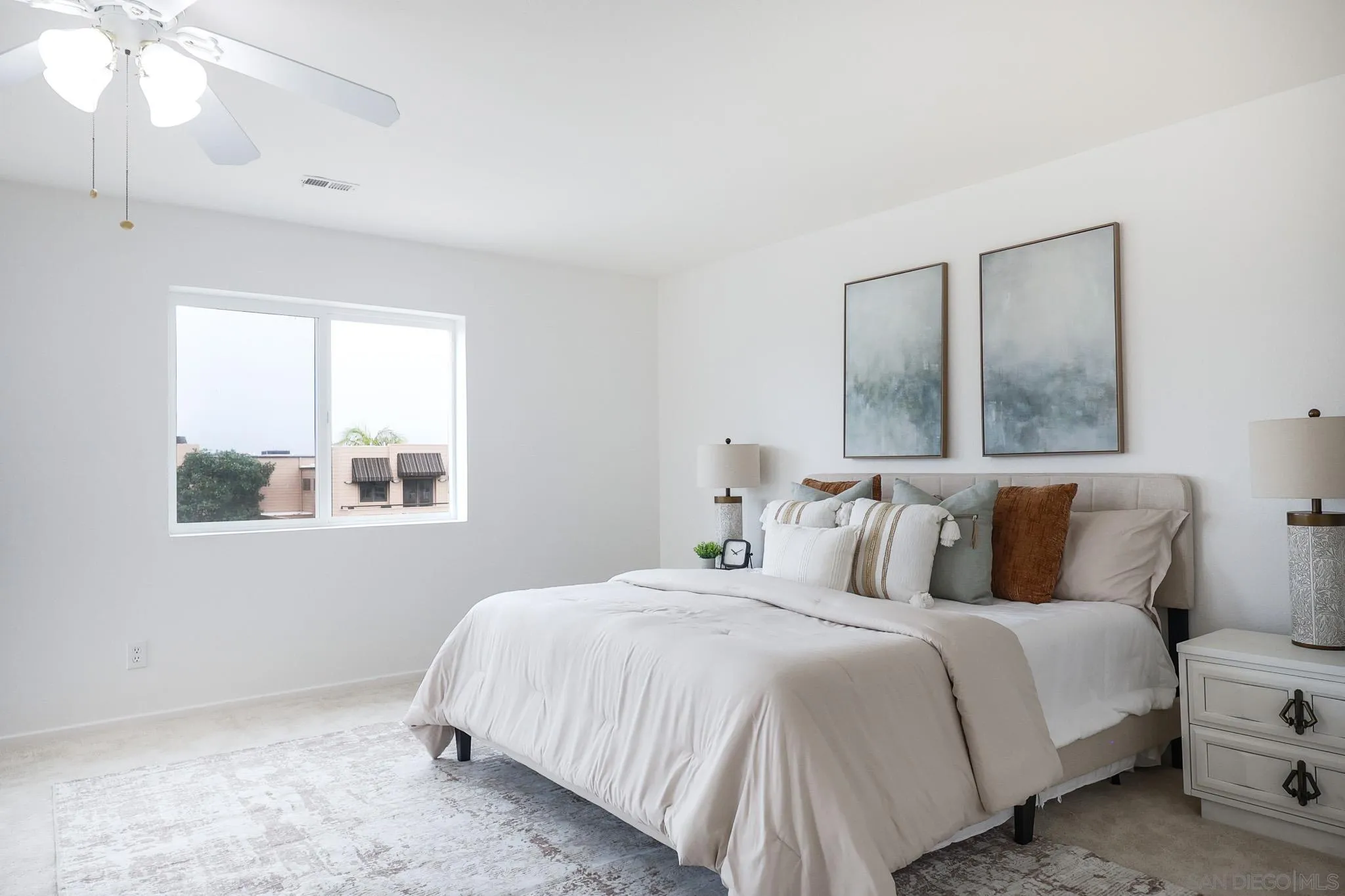 13933 Recuerdo Drive Del Mar, CA 92014 - Photo 21 of 44 a bedroom with a bed and a window