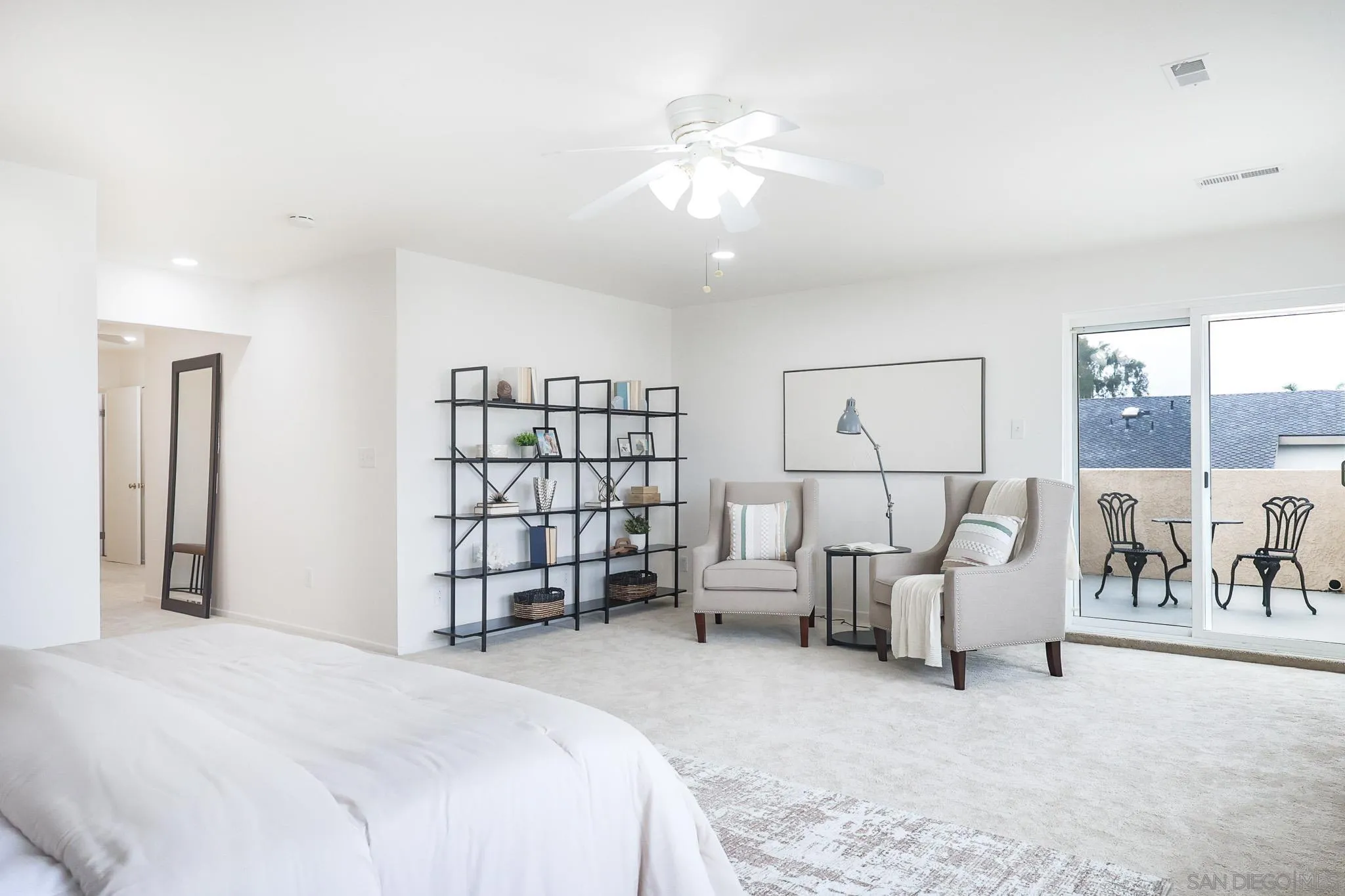 13933 Recuerdo Drive Del Mar, CA 92014 - Photo 22 of 44 a bedroom with furniture and a large mirror